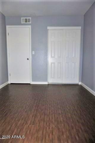 18202 North Cave Creek Road, Unit 231 Phoenix, AZ 85032 - Photo 9 of 18 a view of an empty room