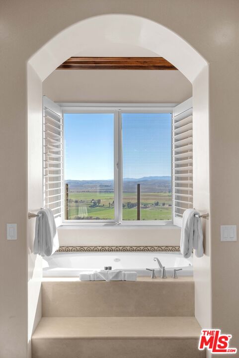 1990 Highway 46 Shandon, CA 93461 - Photo 19 of 57 a bathroom with a bathtub and window