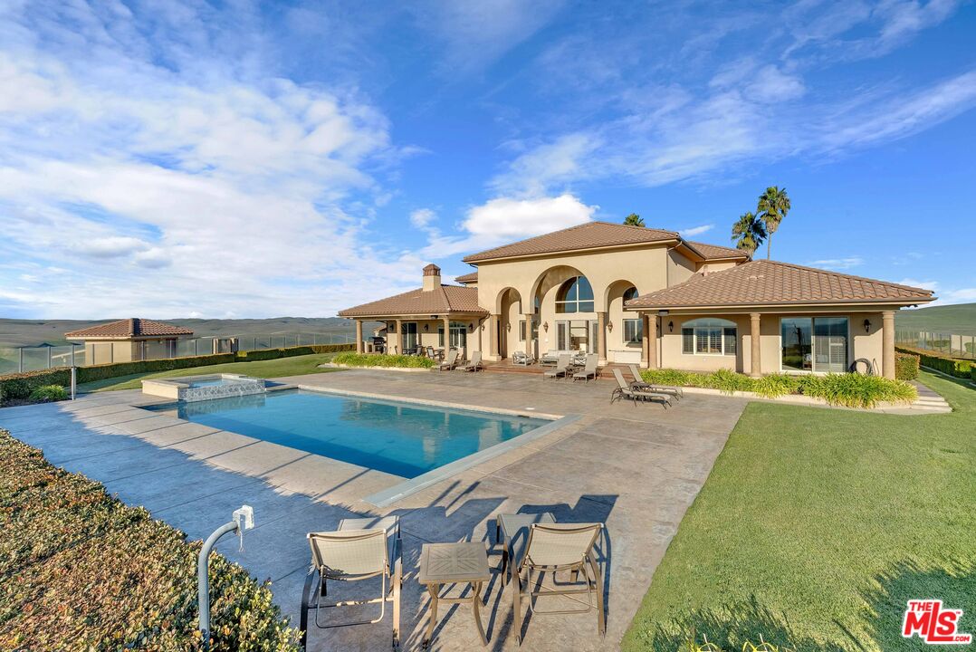 1990 Highway 46 Shandon, CA 93461 - Photo 2 of 57 a front view of a house with swimming pool