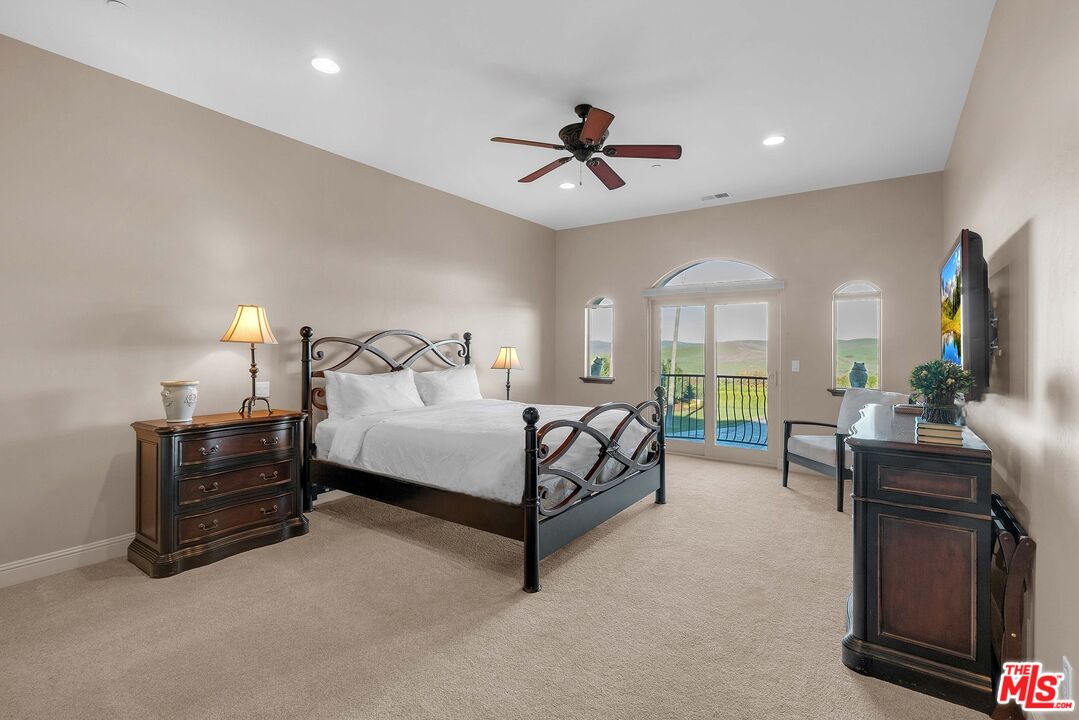 1990 Highway 46 Shandon, CA 93461 - Photo 29 of 57 a bed room with a bed window and a chair