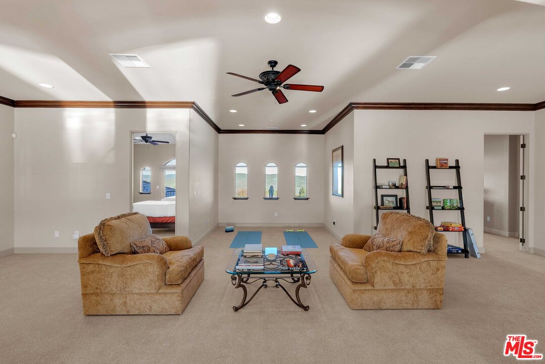 1990 Highway 46 Shandon, CA 93461 - Photo 30 of 57 a living room with furniture and a chandelier