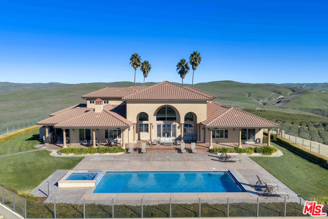 1990 Highway 46 Shandon, CA 93461 - Photo 4 of 57 a front view of house with yard outdoor seating and lake view