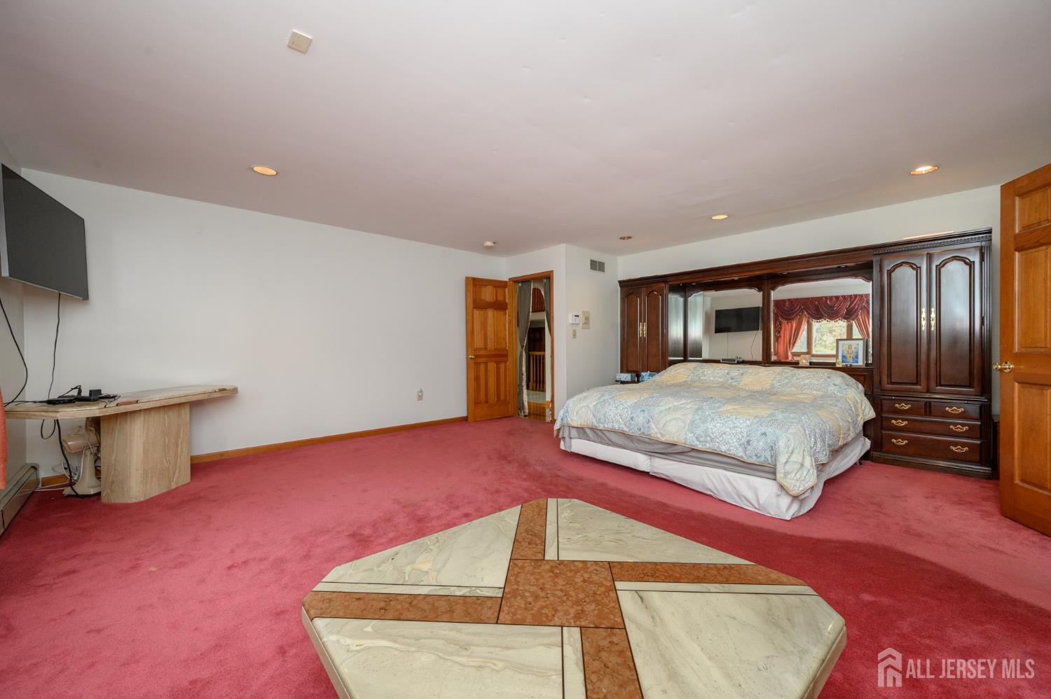 4 Drinking Brook Road Monmouth Junction, NJ 08852 - Photo 22 of 74 a bedroom with a large bed and a couch