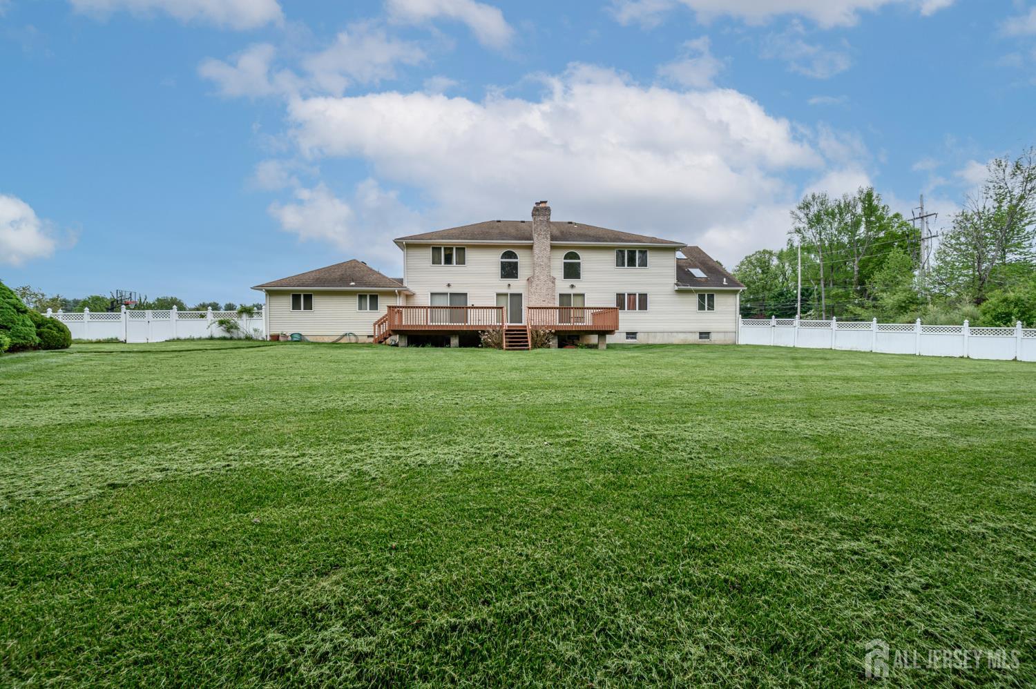 4 Drinking Brook Road Monmouth Junction, NJ 08852 - Photo 64 of 74 a view of a house with a big yard and large trees