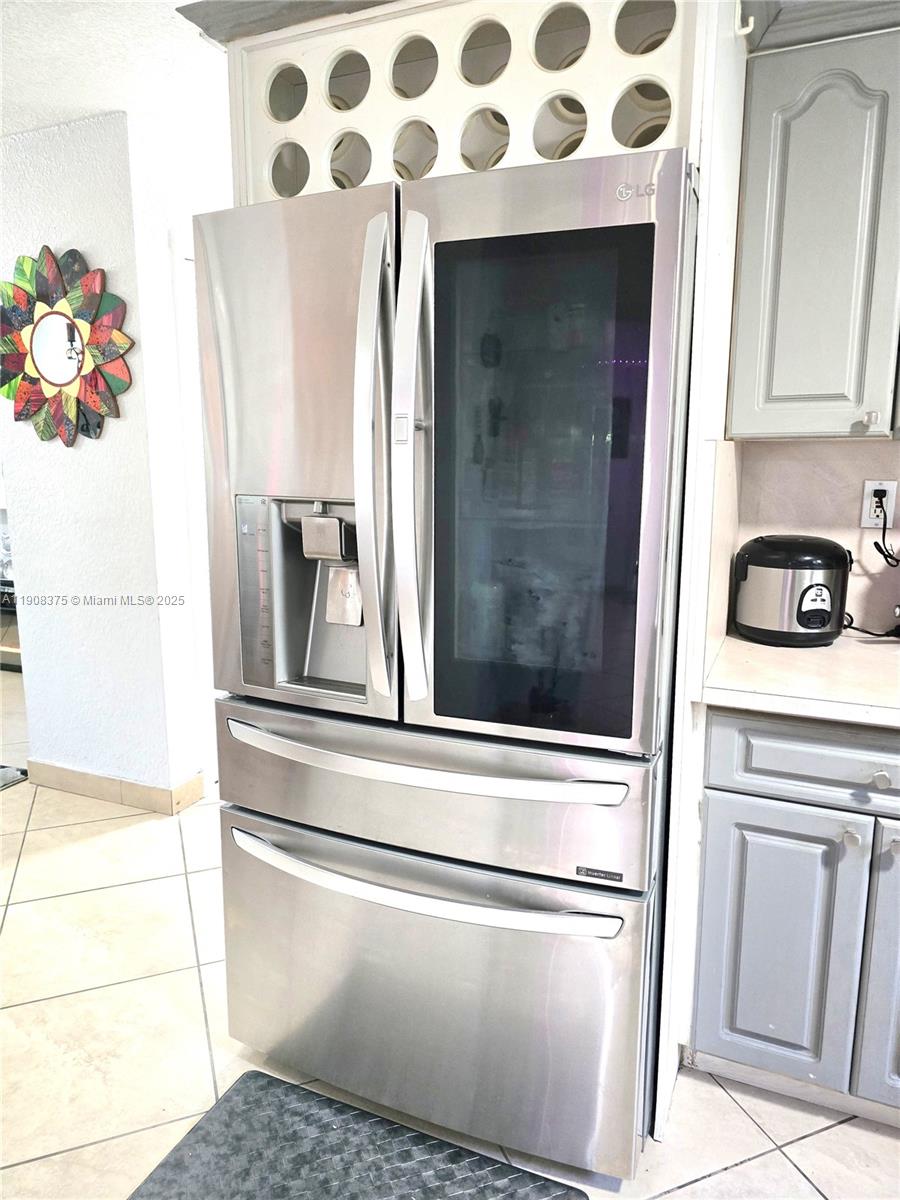 11152 Southwest 7th Street Sweetwater, FL 33174 - Photo 14 of 52 a close view of a utility room with washer and dryer