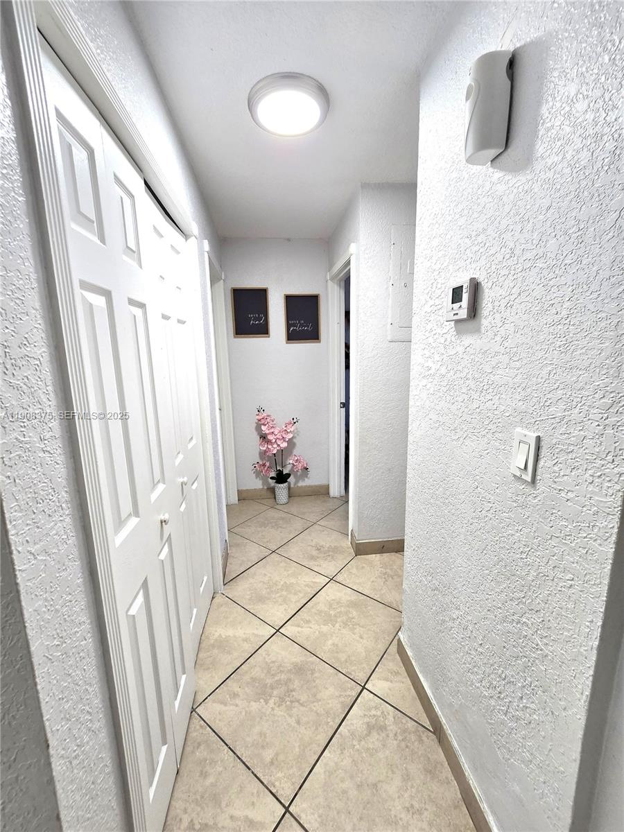 11152 Southwest 7th Street Sweetwater, FL 33174 - Photo 18 of 53 a bathroom with a sink and a mirror