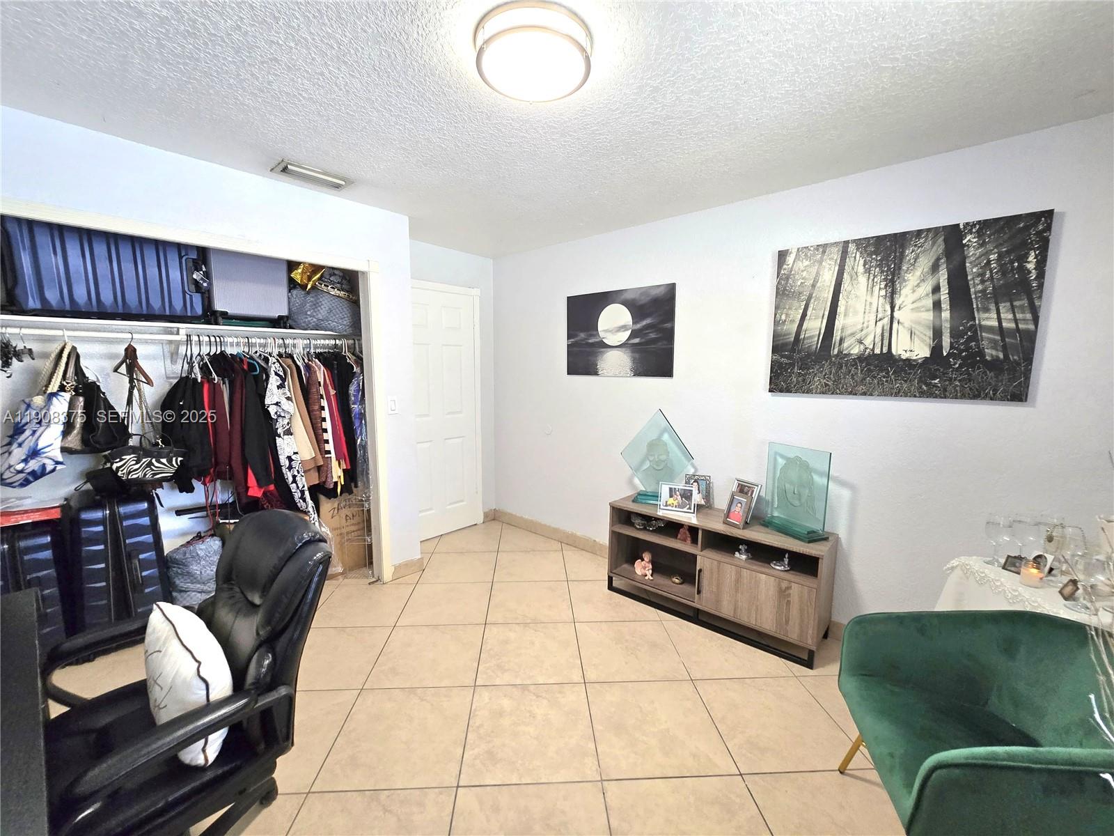 11152 Southwest 7th Street Sweetwater, FL 33174 - Photo 25 of 53 a living room with furniture