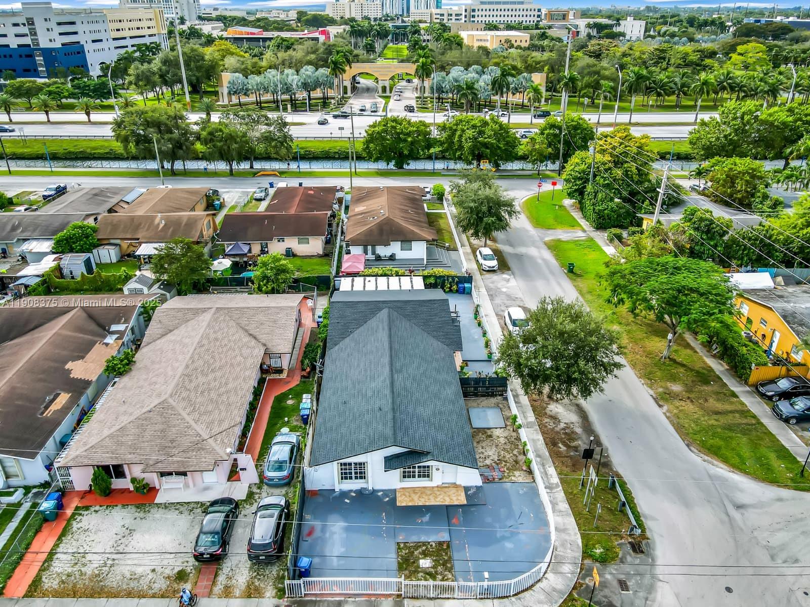 11152 Southwest 7th Street Sweetwater, FL 33174 - Photo 3 of 52 an aerial view of a swimming pool and outdoor space