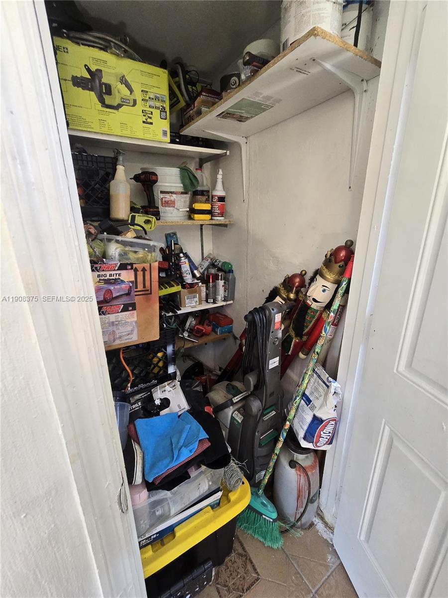 11152 Southwest 7th Street Sweetwater, FL 33174 - Photo 33 of 53 a room with storage and utility