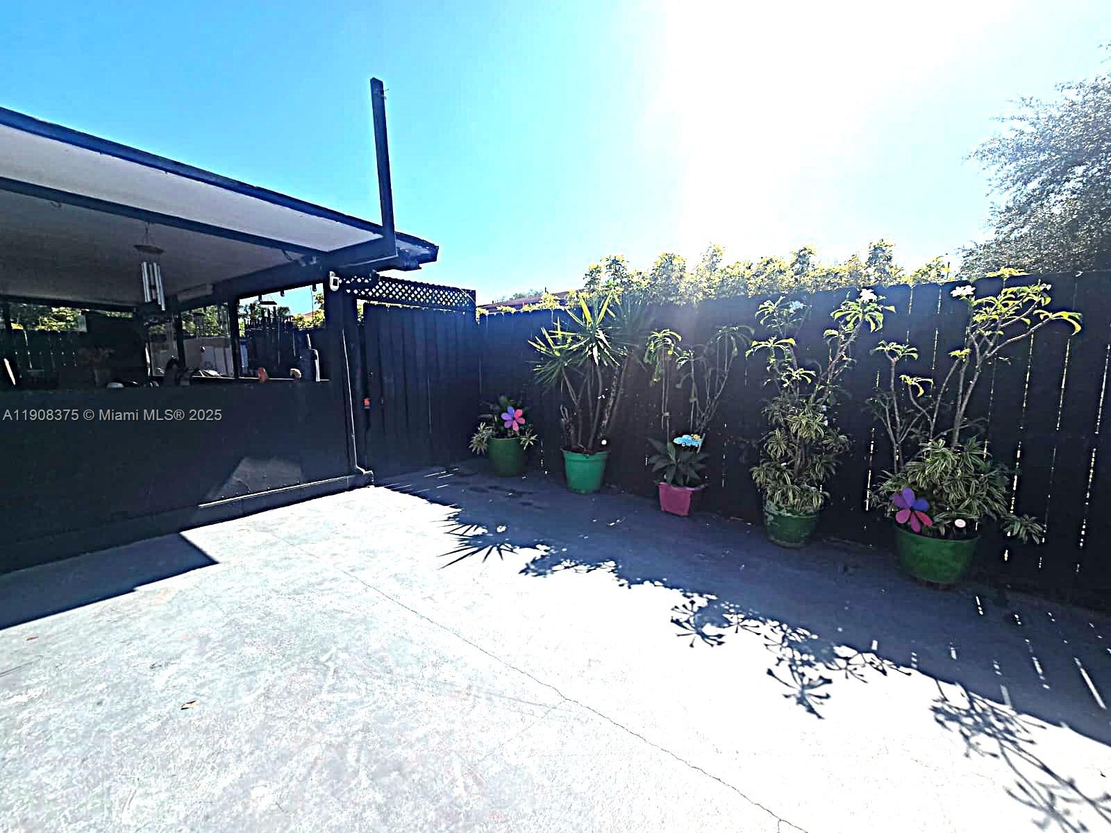 11152 Southwest 7th Street Sweetwater, FL 33174 - Photo 37 of 52 a view of a garden