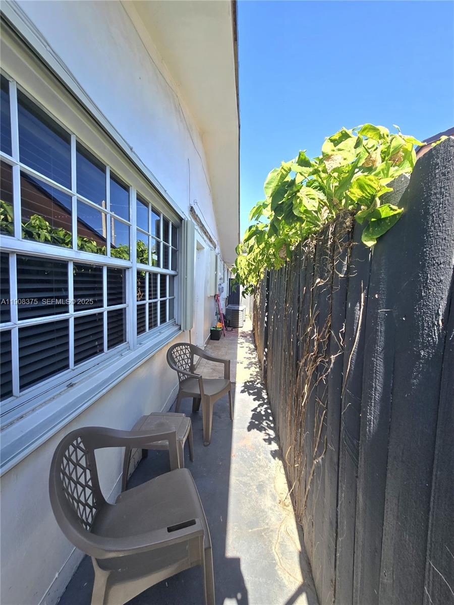 11152 Southwest 7th Street Sweetwater, FL 33174 - Photo 38 of 53 a view of balcony with a potted plant