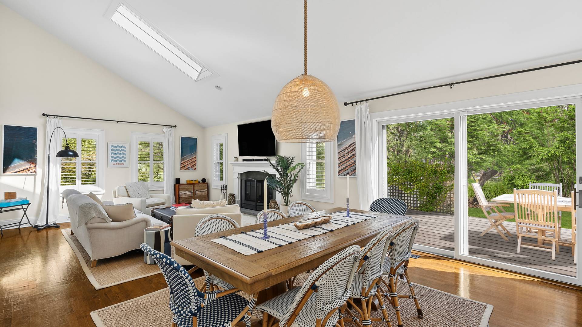 4 Arthur Avenue Bridgehampton, NY 11932 - Photo 4 of 13 a living room with fireplace furniture and a large window