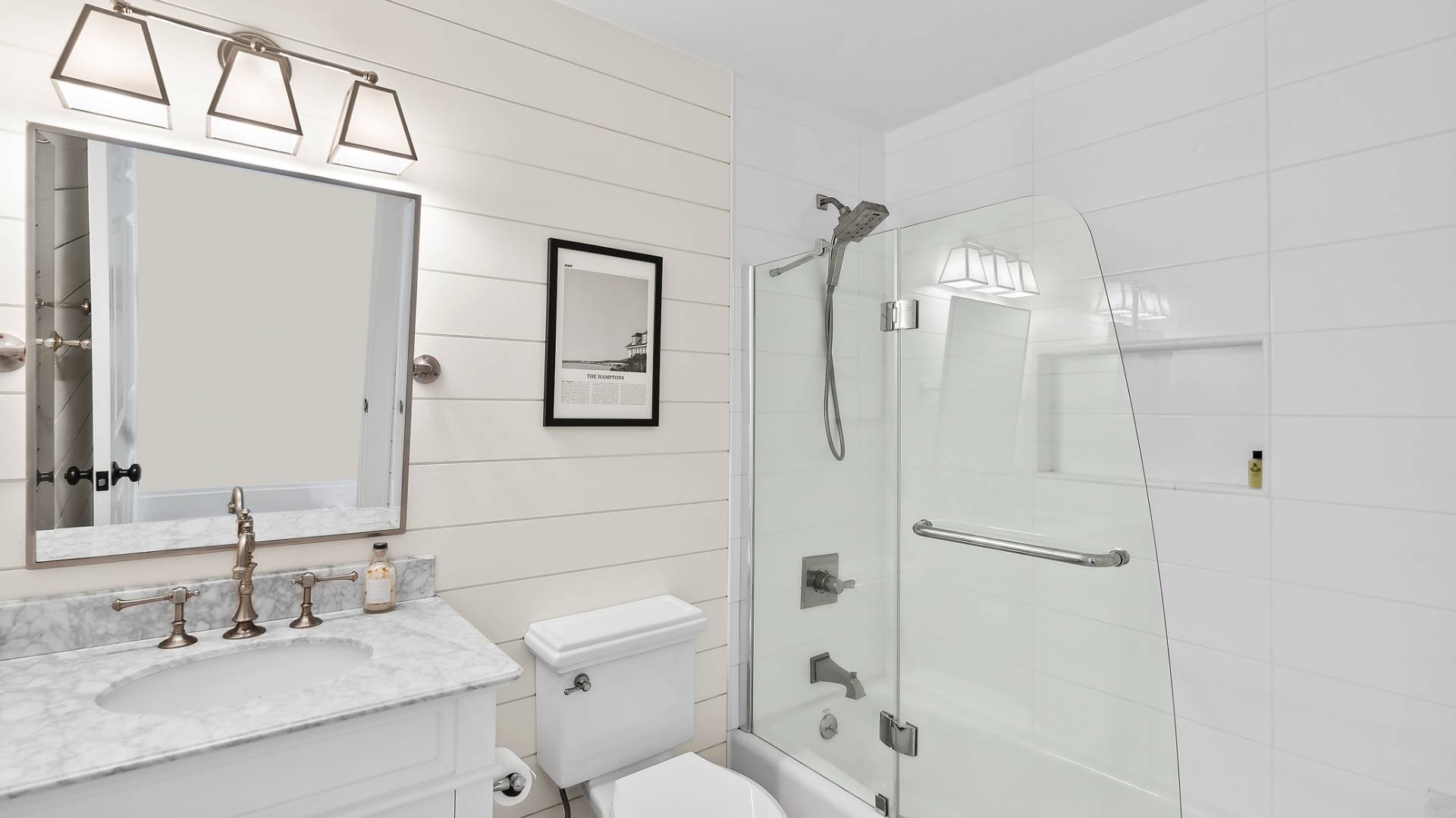 4 Arthur Avenue Bridgehampton, NY 11932 - Photo 9 of 13 a bathroom with a sink toilet and shower