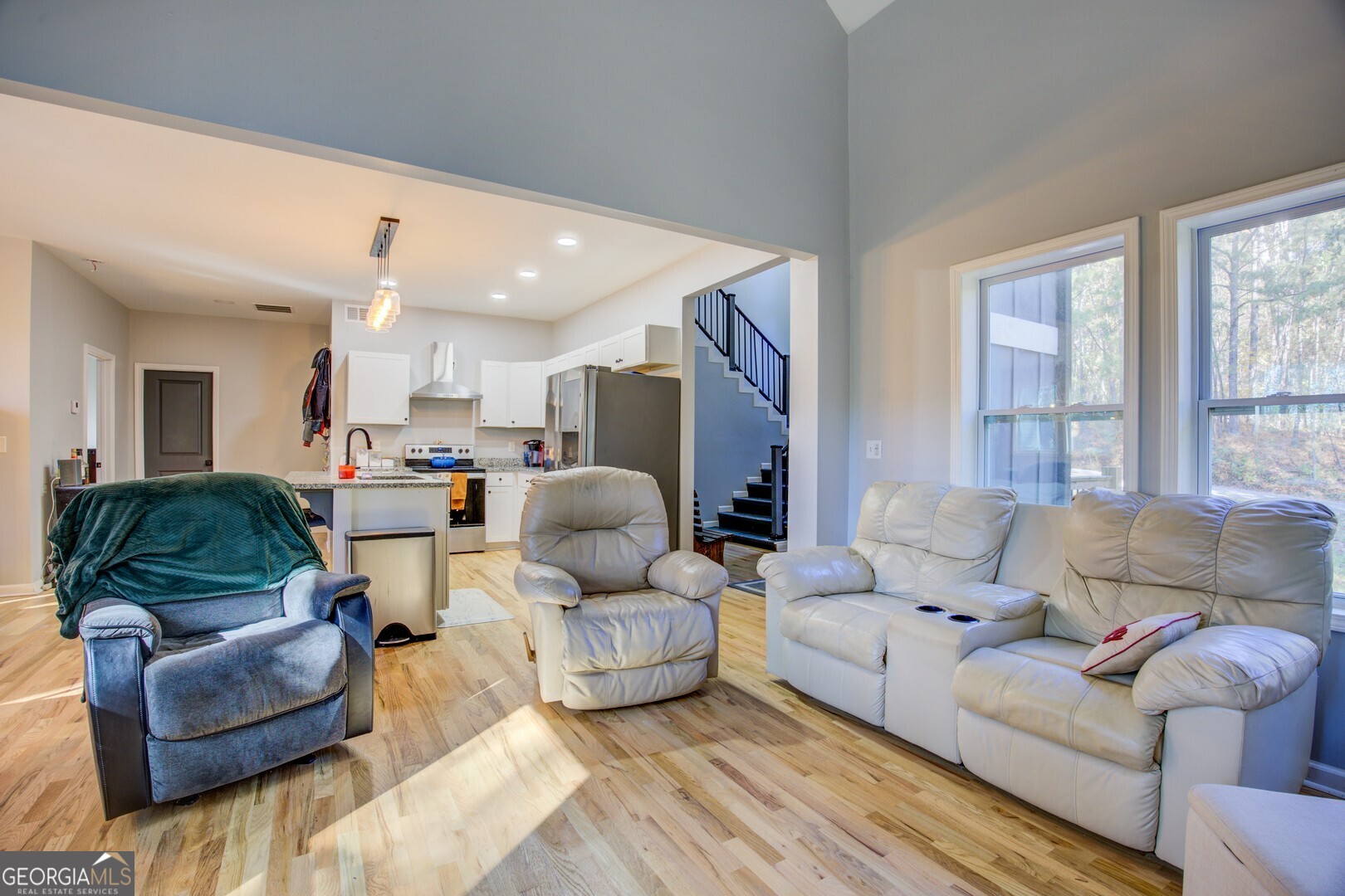 13 Goldfinch Circle Monticello, GA 31064 - Photo 17 of 44 a living room with furniture and a large window