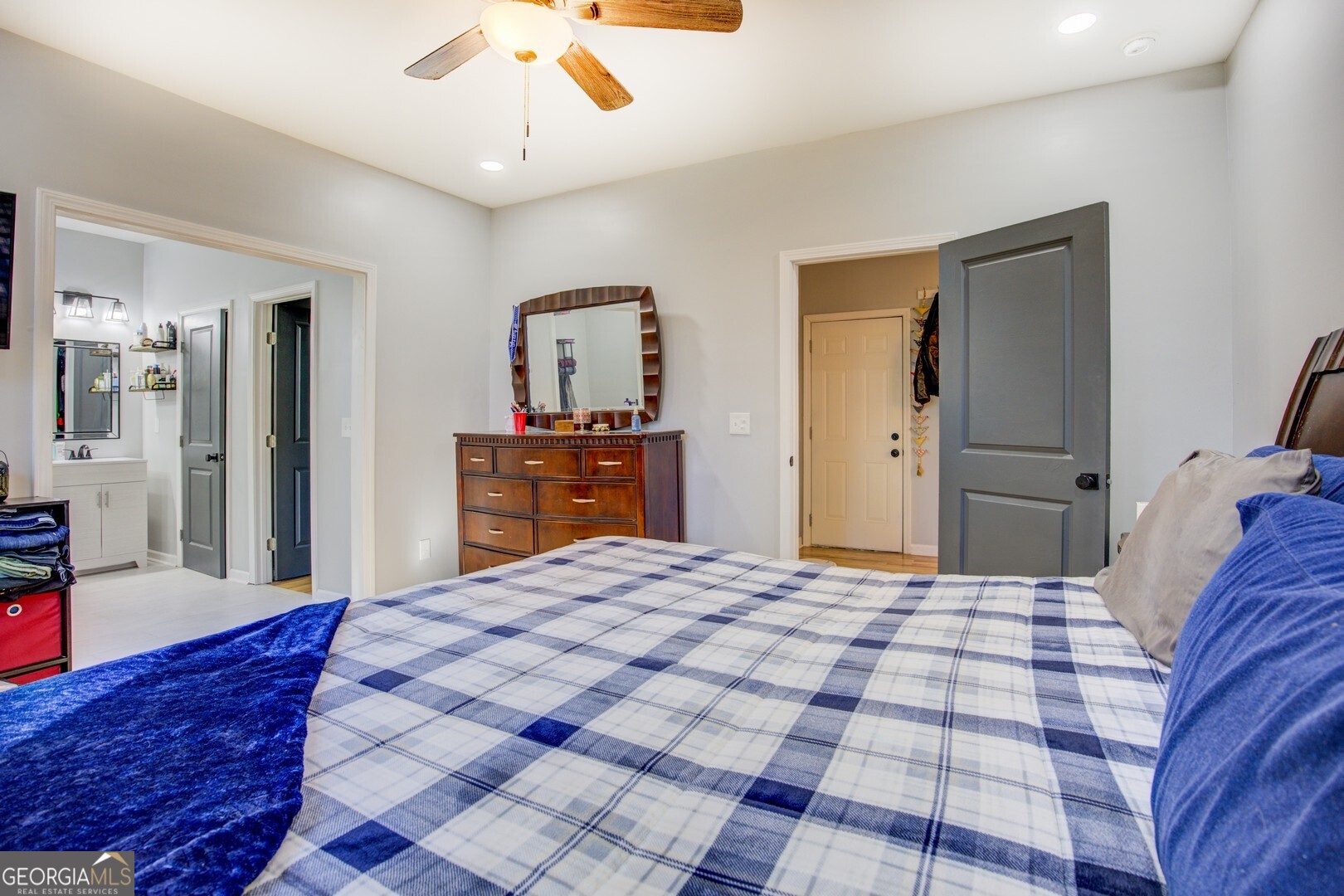 13 Goldfinch Circle Monticello, GA 31064 - Photo 26 of 44 a bedroom with a bed and a dresser
