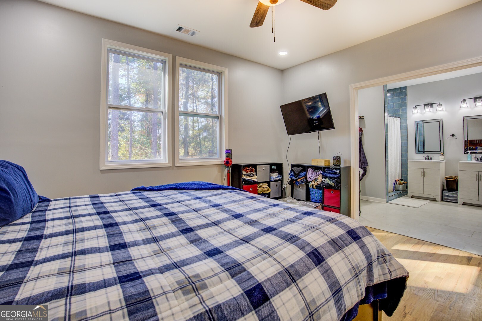 13 Goldfinch Circle Monticello, GA 31064 - Photo 27 of 44 a bed room with a bed and a television