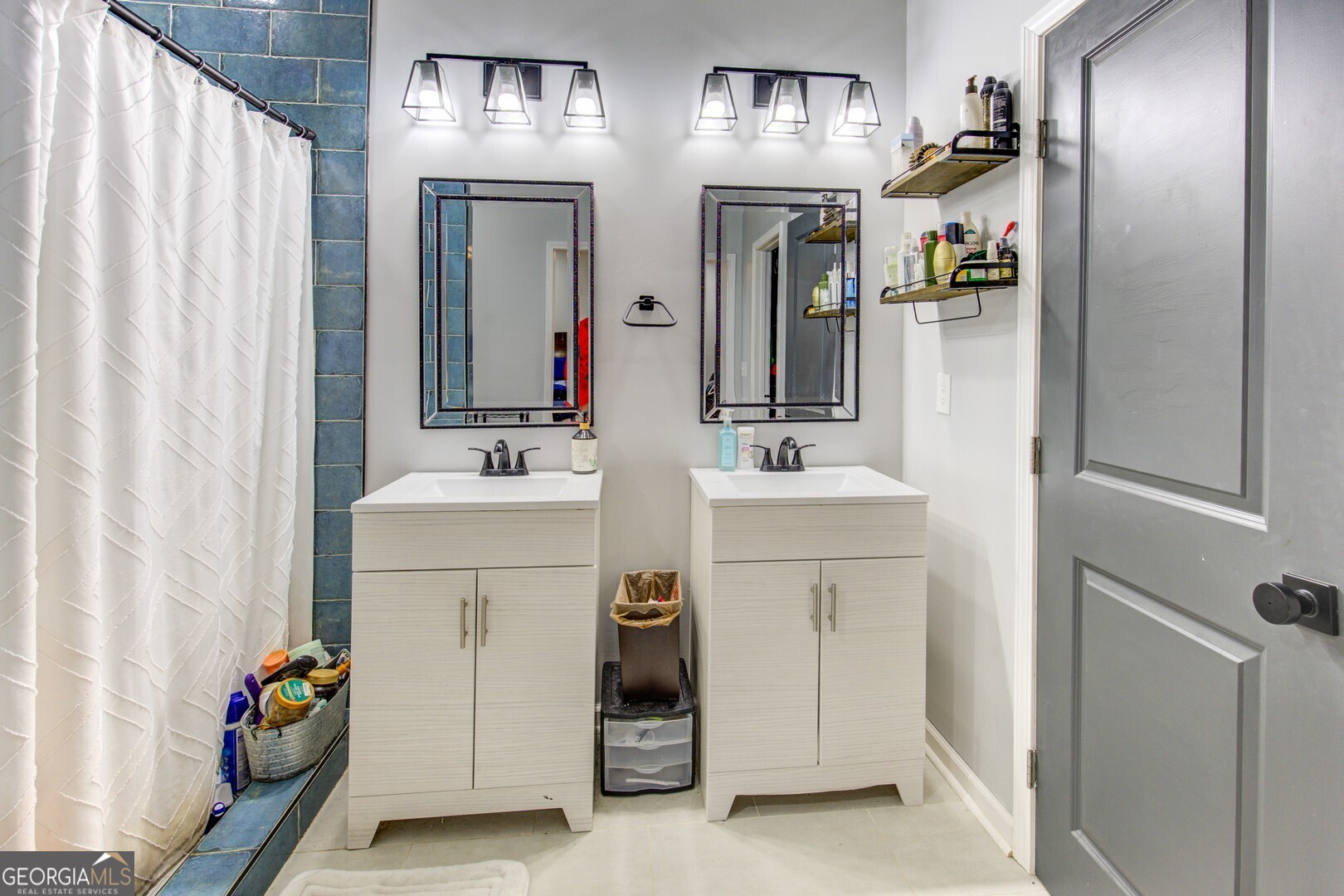 13 Goldfinch Circle Monticello, GA 31064 - Photo 28 of 44 a bathroom with a sink vanity and a mirror