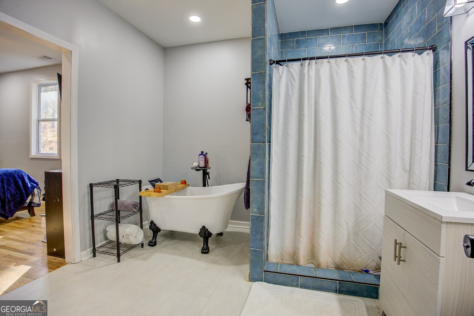 13 Goldfinch Circle Monticello, GA 31064 - Photo 30 of 44 a white bath tub sitting next to a white toilet and a shower