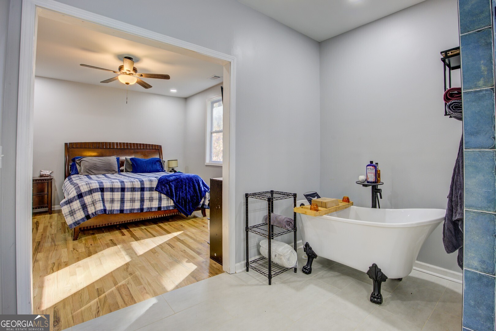 13 Goldfinch Circle Monticello, GA 31064 - Photo 31 of 44 a living room with furniture and a chandelier