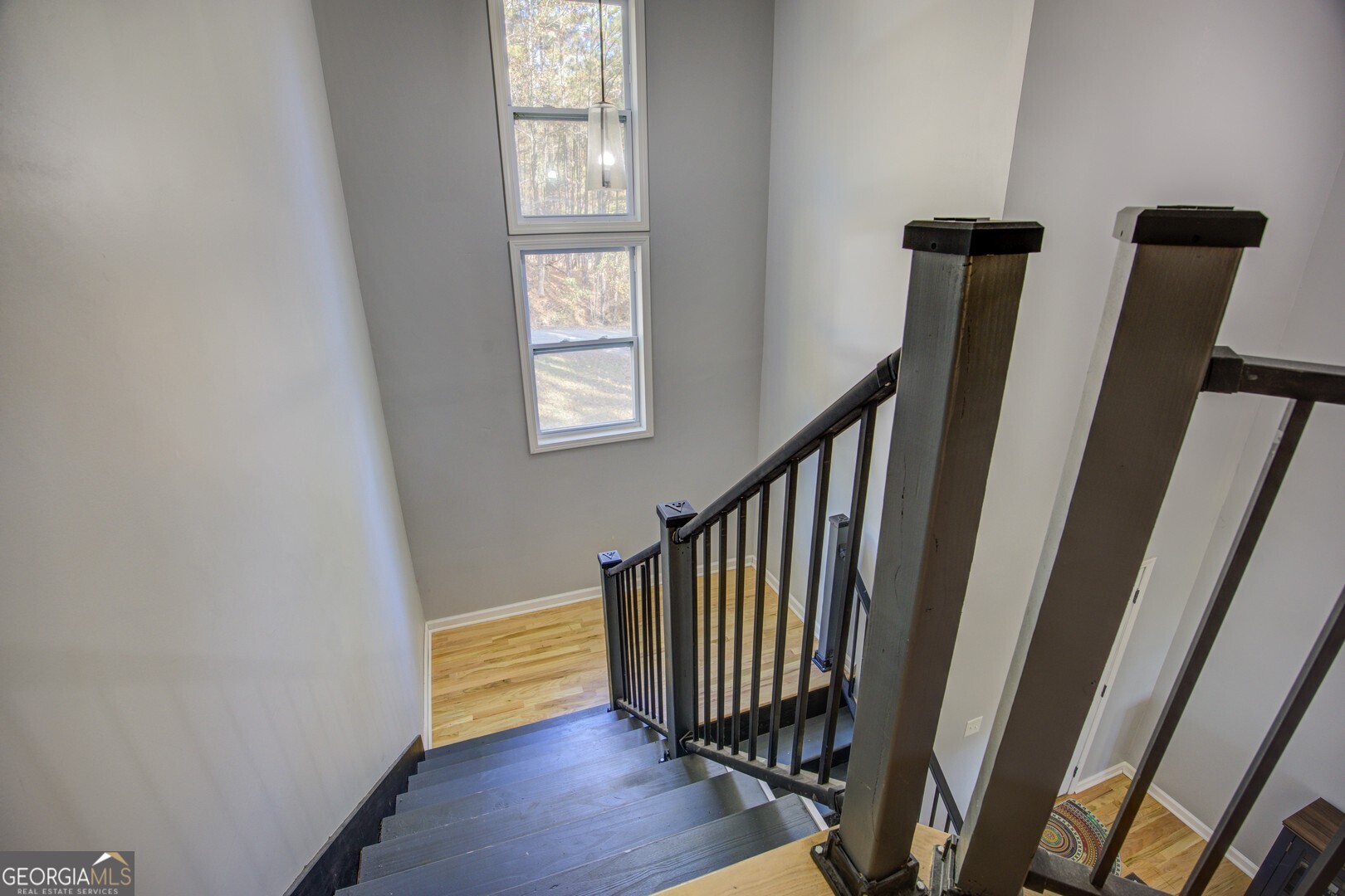 13 Goldfinch Circle Monticello, GA 31064 - Photo 37 of 44 a view of entryway with wooden floor and stairs