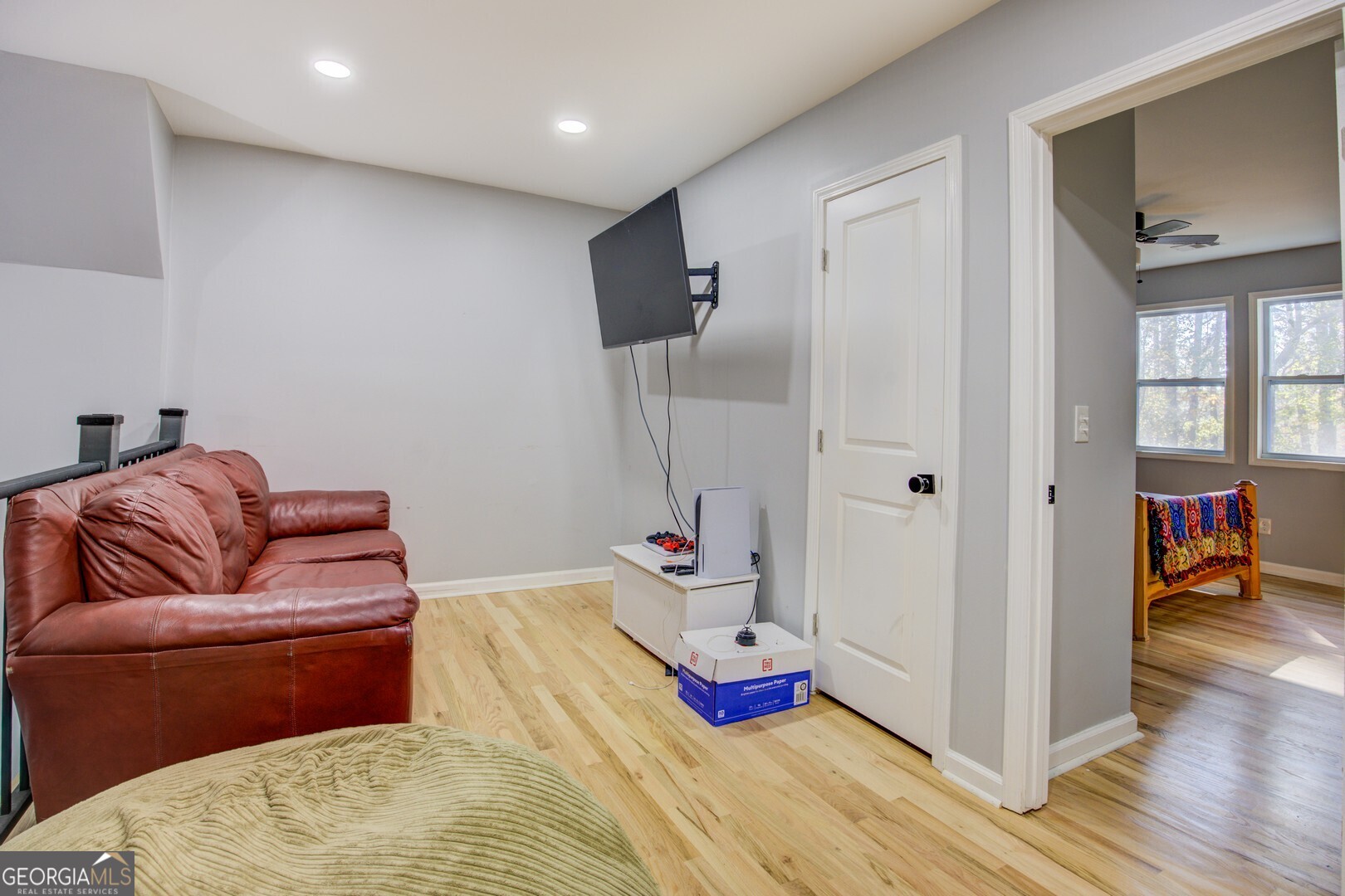 13 Goldfinch Circle Monticello, GA 31064 - Photo 38 of 44 a bedroom with furniture and a wooden floor