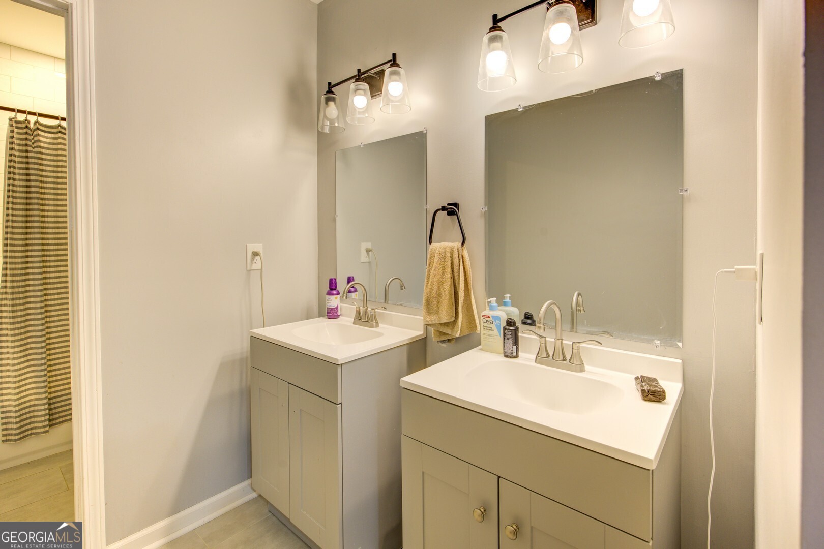 13 Goldfinch Circle Monticello, GA 31064 - Photo 41 of 44 a bathroom with a sink and a mirror