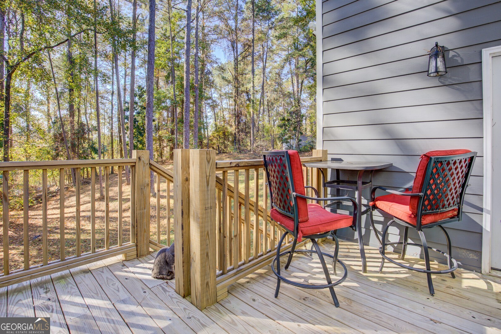 13 Goldfinch Circle Monticello, GA 31064 - Photo 10 of 44 a view of a chairs on the deck