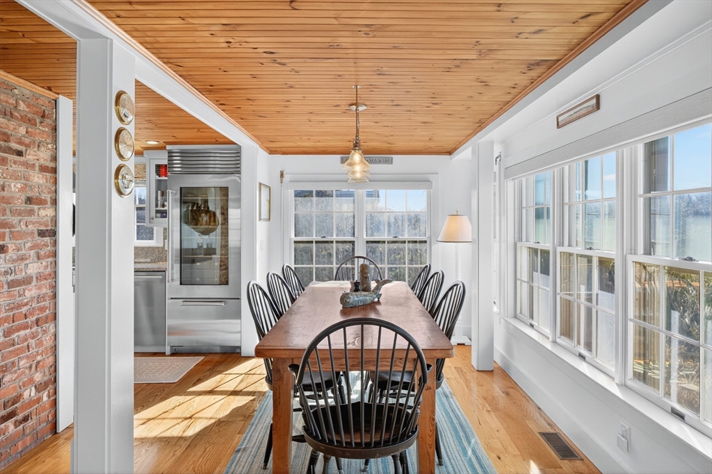 1145 Kingsbury Beach Road Eastham, MA 02642 - Photo 22 of 42 a balcony view with a seating space