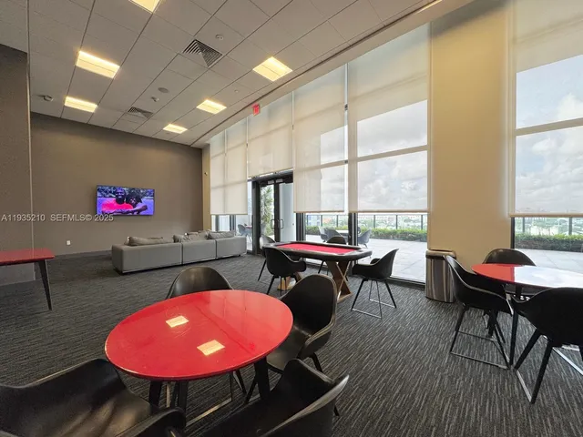 a view of a living room and dining room
