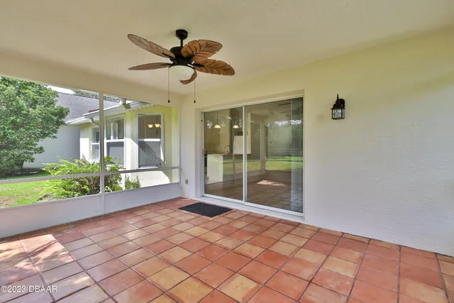 a front view of a house with yard and green space