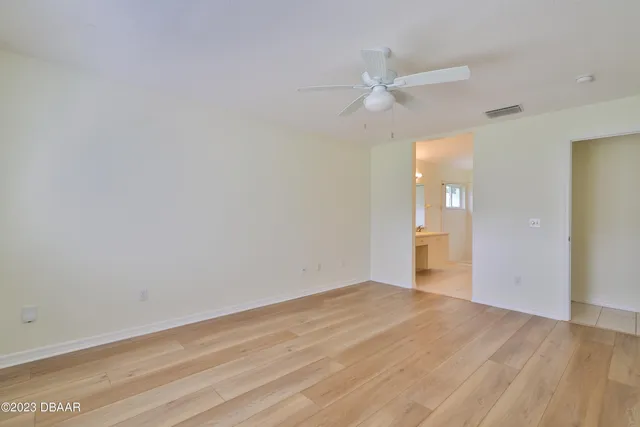 a bathroom with a sink a vanity and a mirror