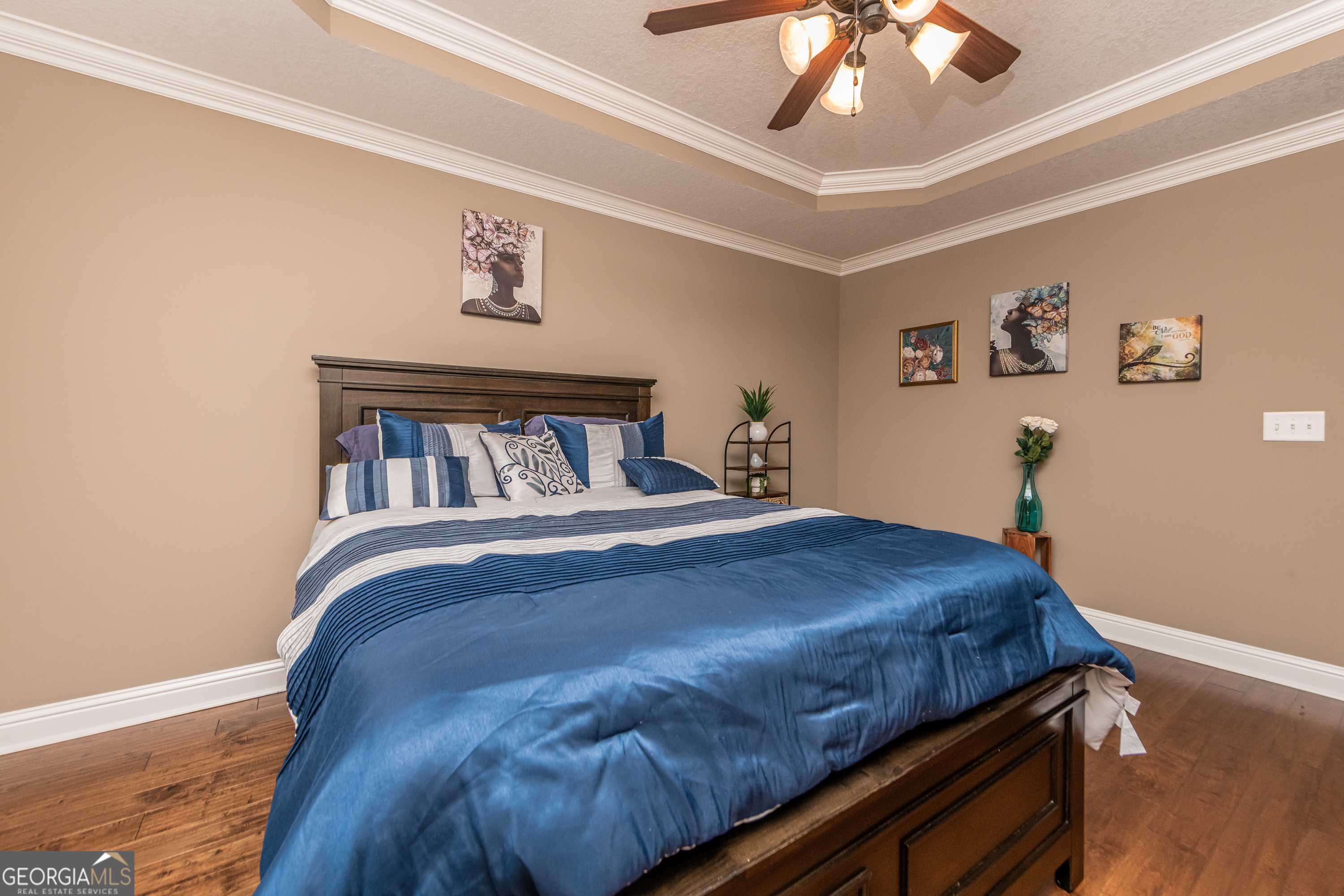 405 Old Bridge Road Warner Robins, GA 31088 - Photo 44 of 55 a bedroom with a bed and a chandelier