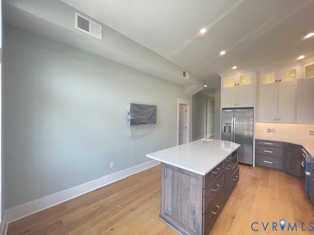 45 Cross Street, Unit B Urbanna, VA 23175 - Photo 12 of 25 a kitchen with a stove a refrigerator and a sink
