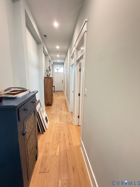 45 Cross Street, Unit B Urbanna, VA 23175 - Photo 17 of 25 a view of a hallway with wooden floor