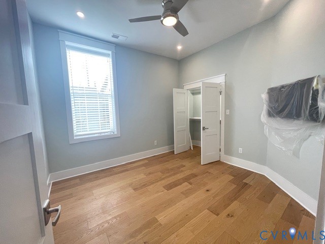 45 Cross Street, Unit B Urbanna, VA 23175 - Photo 18 of 25 a view of an empty room with a window