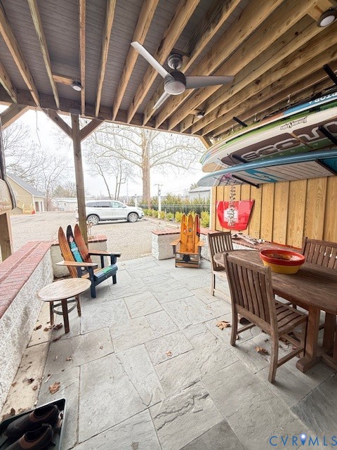 45 Cross Street, Unit B Urbanna, VA 23175 - Photo 4 of 25 a view of a chairs and tables in patio