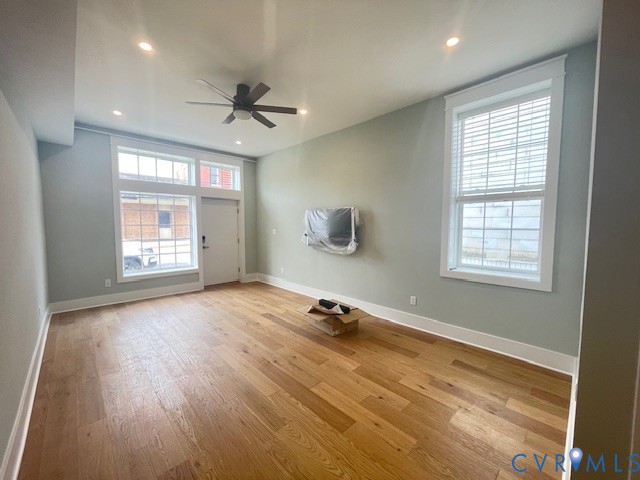 45 Cross Street, Unit B Urbanna, VA 23175 - Photo 8 of 25 a view of an empty room with a window