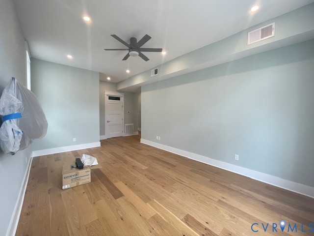 45 Cross Street, Unit B Urbanna, VA 23175 - Photo 9 of 25 a view of an empty room and window