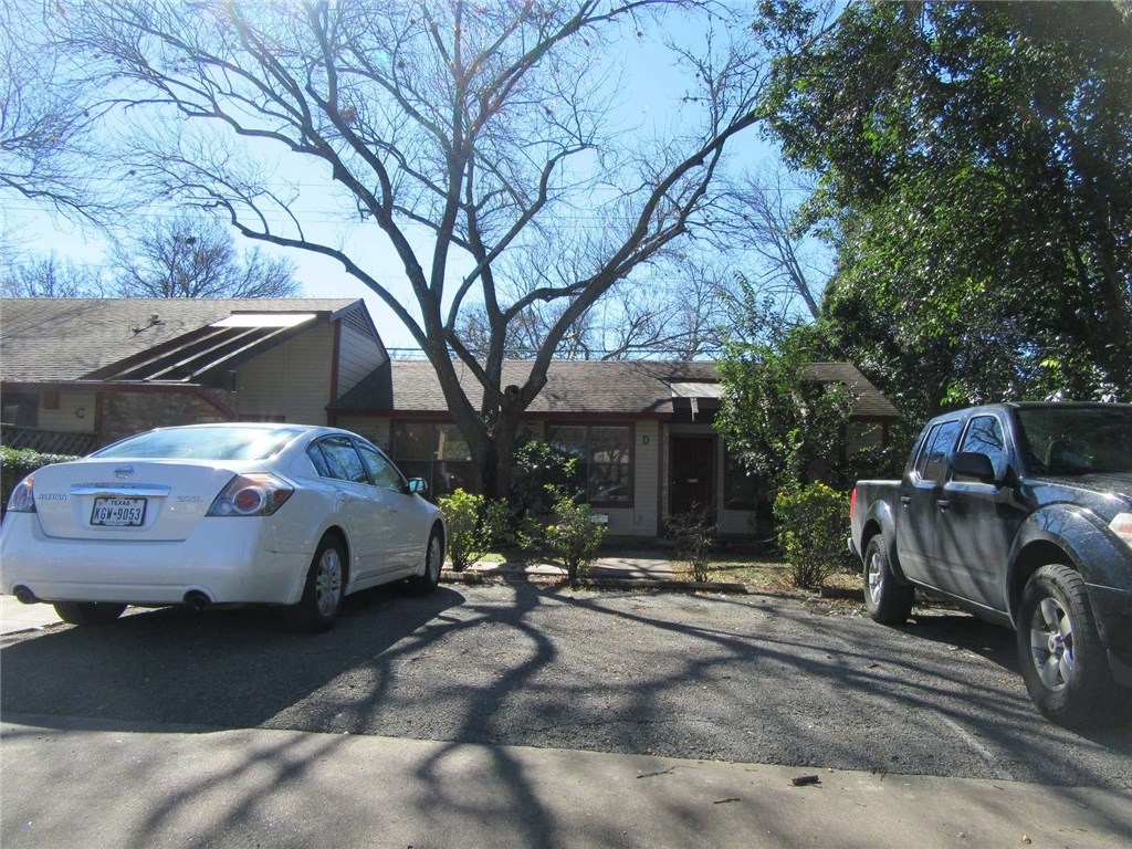 a car parked in front of a house