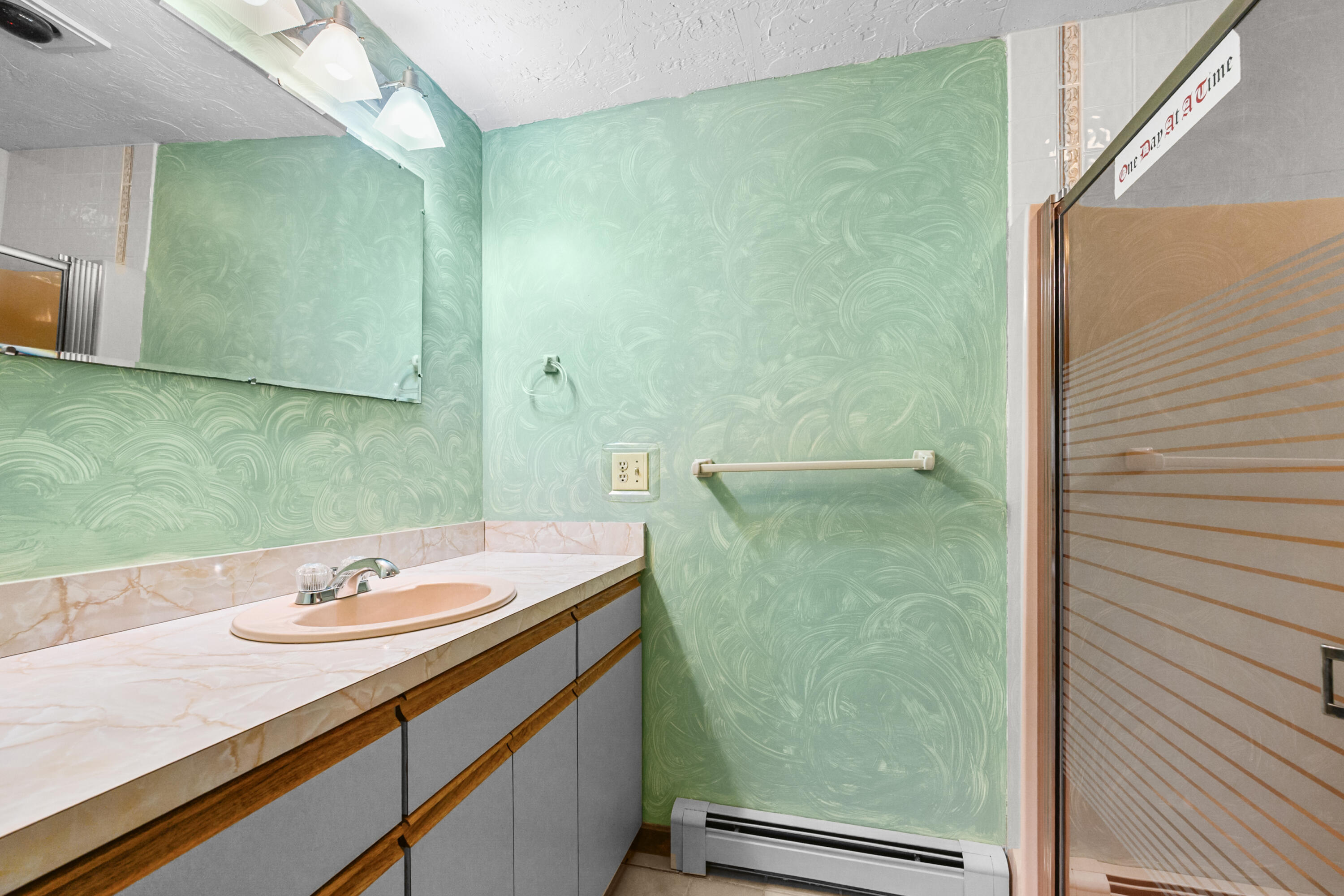 9 Crestview Dr Extension Sandwich, MA 02537 - Photo 20 of 45 a bathroom with a sink a mirror and a shower