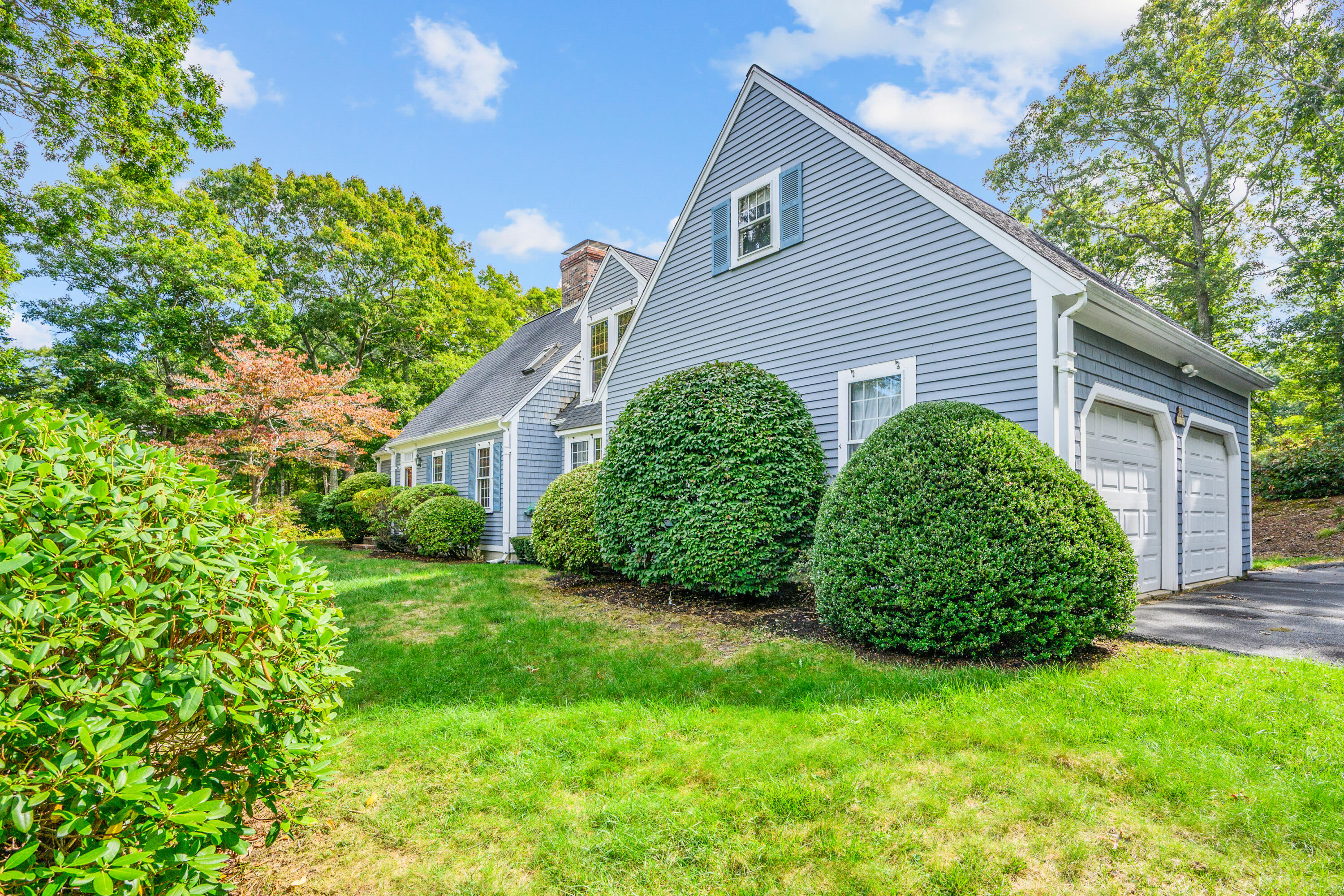 9 Crestview Dr Extension Sandwich, MA 02537 - Photo 2 of 45 a view of a house with a garden