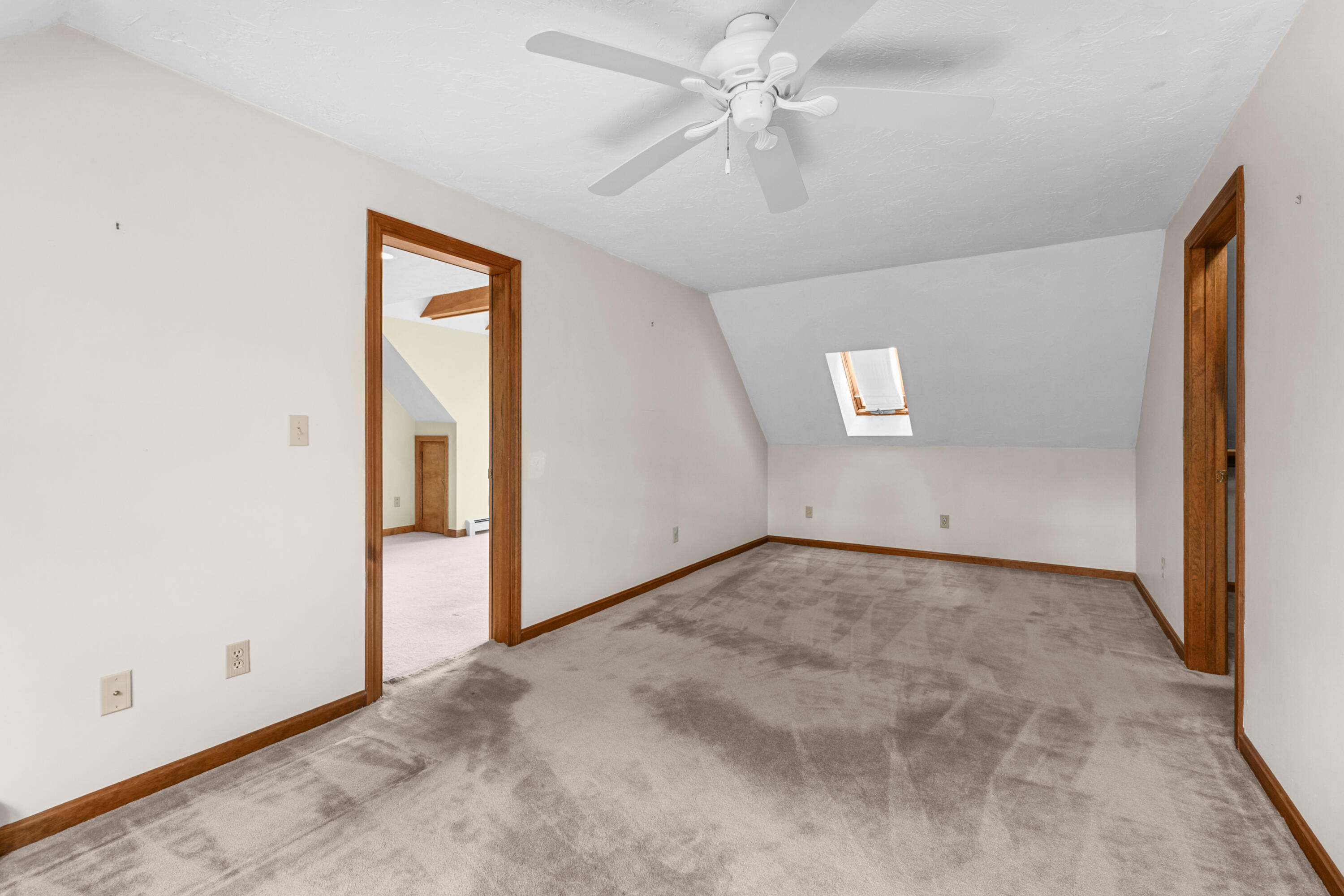9 Crestview Dr Extension Sandwich, MA 02537 - Photo 27 of 45 an empty room with a ceiling fan and a window