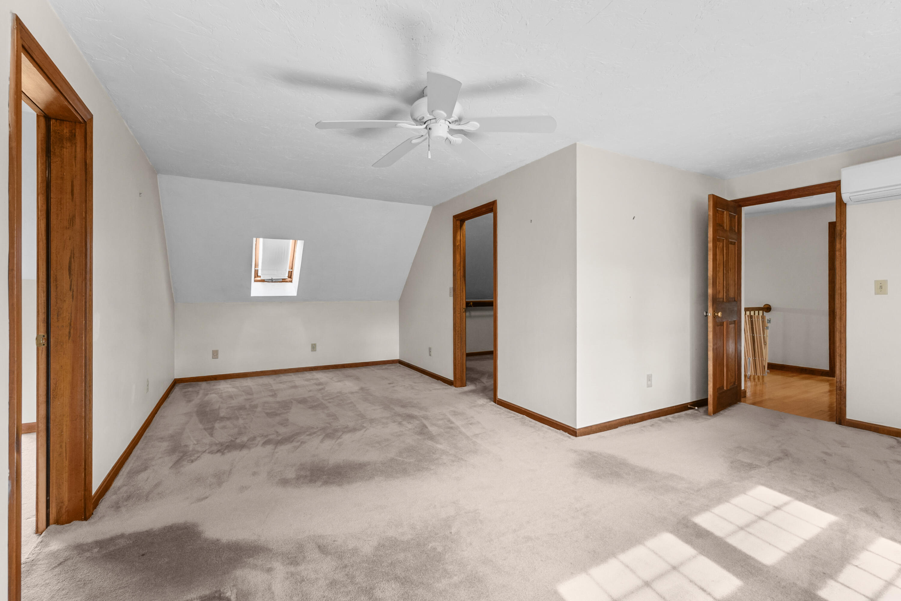 9 Crestview Dr Extension Sandwich, MA 02537 - Photo 28 of 45 a view of a livingroom with an empty space and a ceiling fan