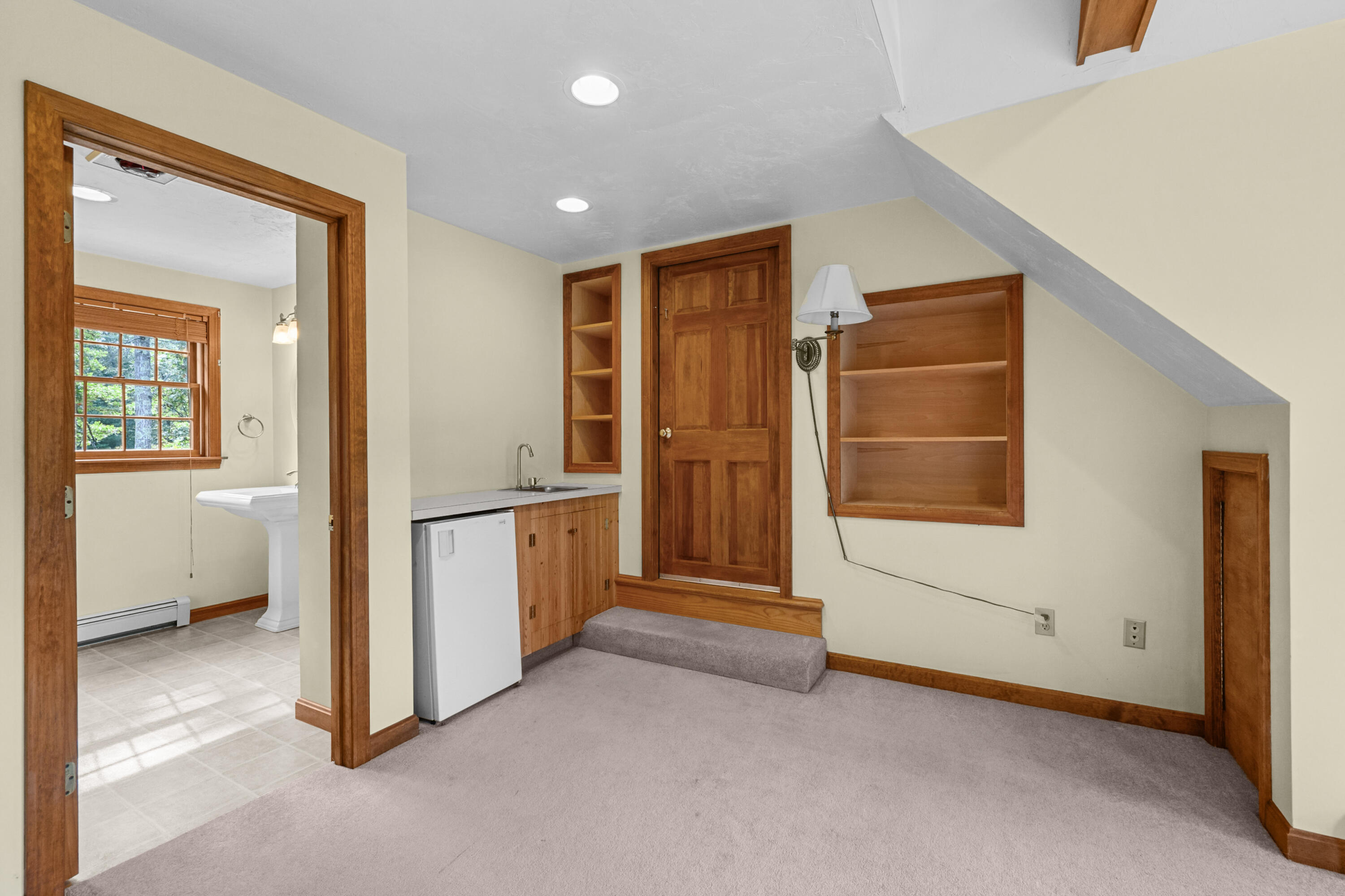 9 Crestview Dr Extension Sandwich, MA 02537 - Photo 33 of 45 a view of an empty room with window and stairs