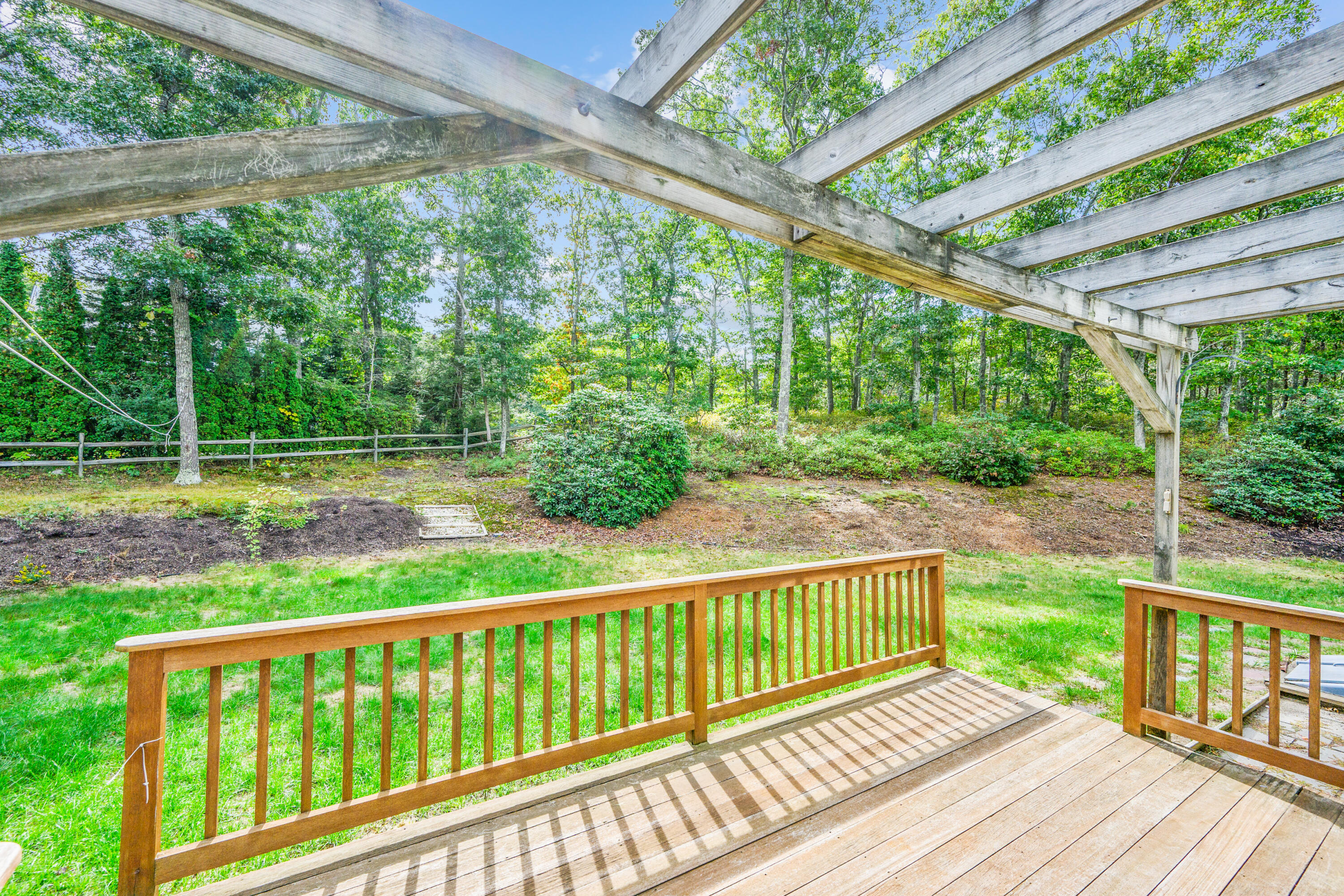 9 Crestview Dr Extension Sandwich, MA 02537 - Photo 39 of 45 a view of a wooden deck next to a yard