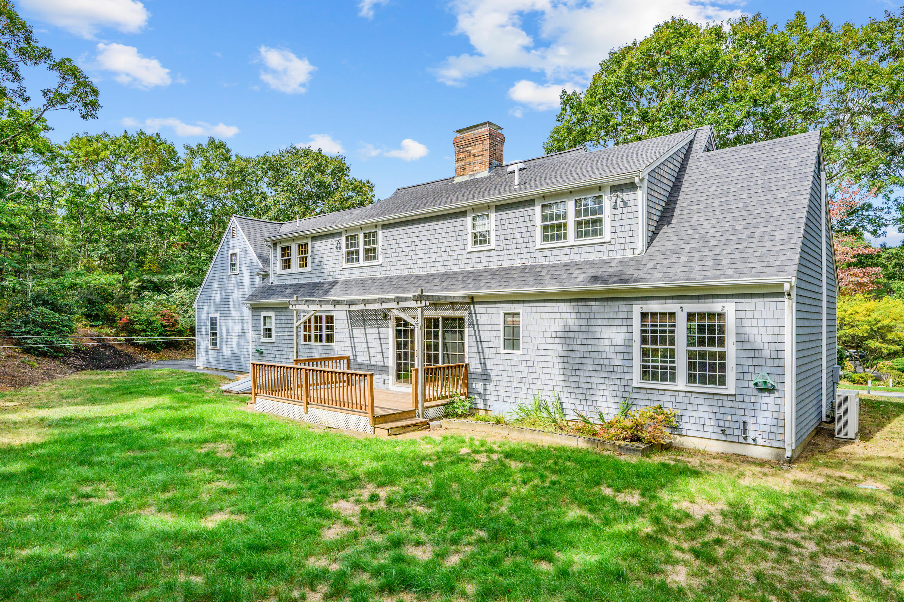 9 Crestview Dr Extension Sandwich, MA 02537 - Photo 4 of 45 front view of a house with a yard