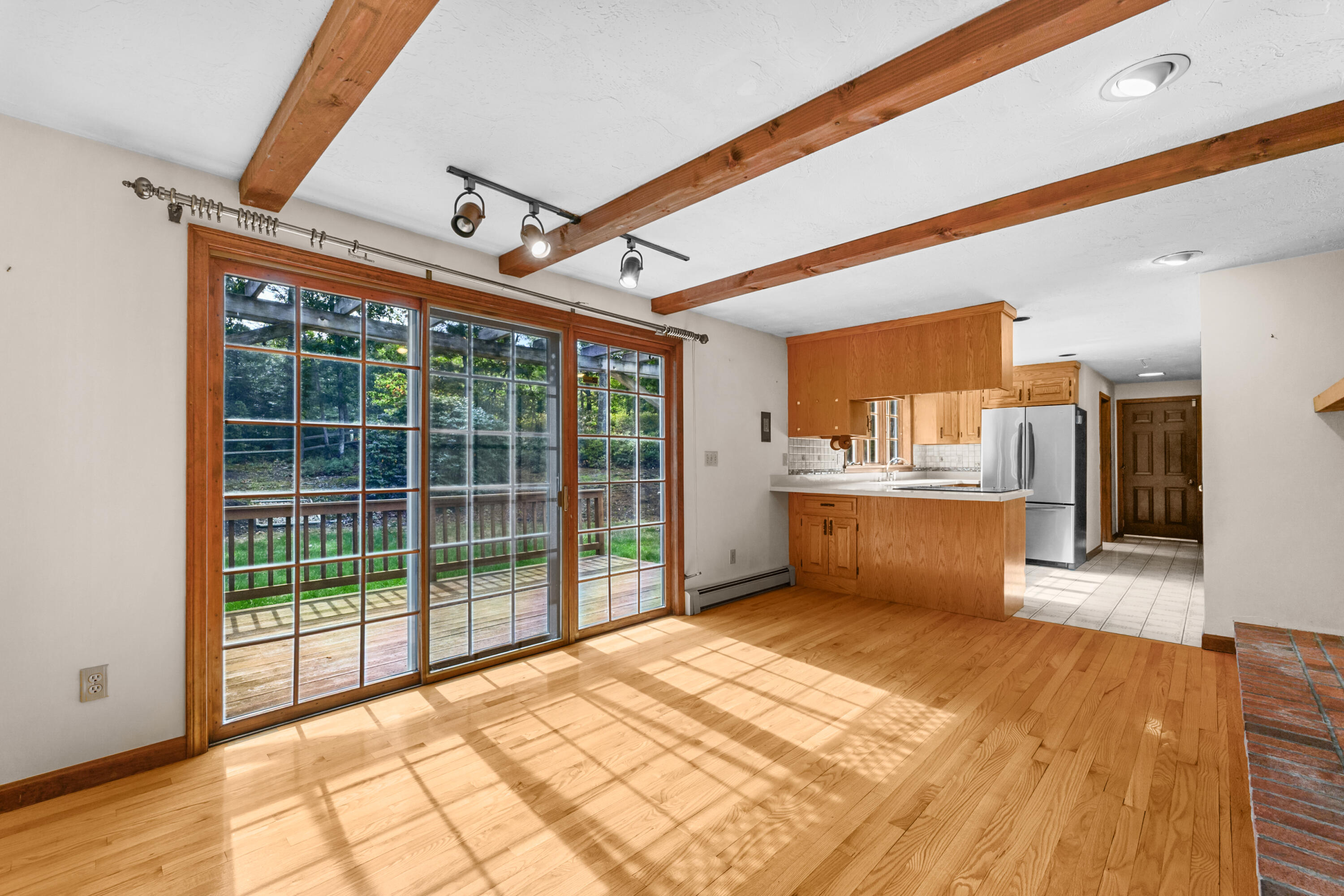 9 Crestview Dr Extension Sandwich, MA 02537 - Photo 10 of 45 a view of empty room with wooden floor and fan