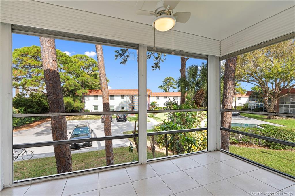 2600 Southeast Ocean Boulevard, Unit EE12 Stuart, FL 34996 - Photo 21 of 43 a view of a room with wooden floor and outdoor view