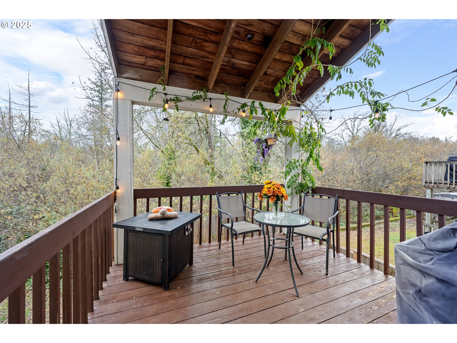 16033 Northwest Ridgetop Lane Beaverton, OR 97006 - Photo 12 of 42 a balcony with wooden floor