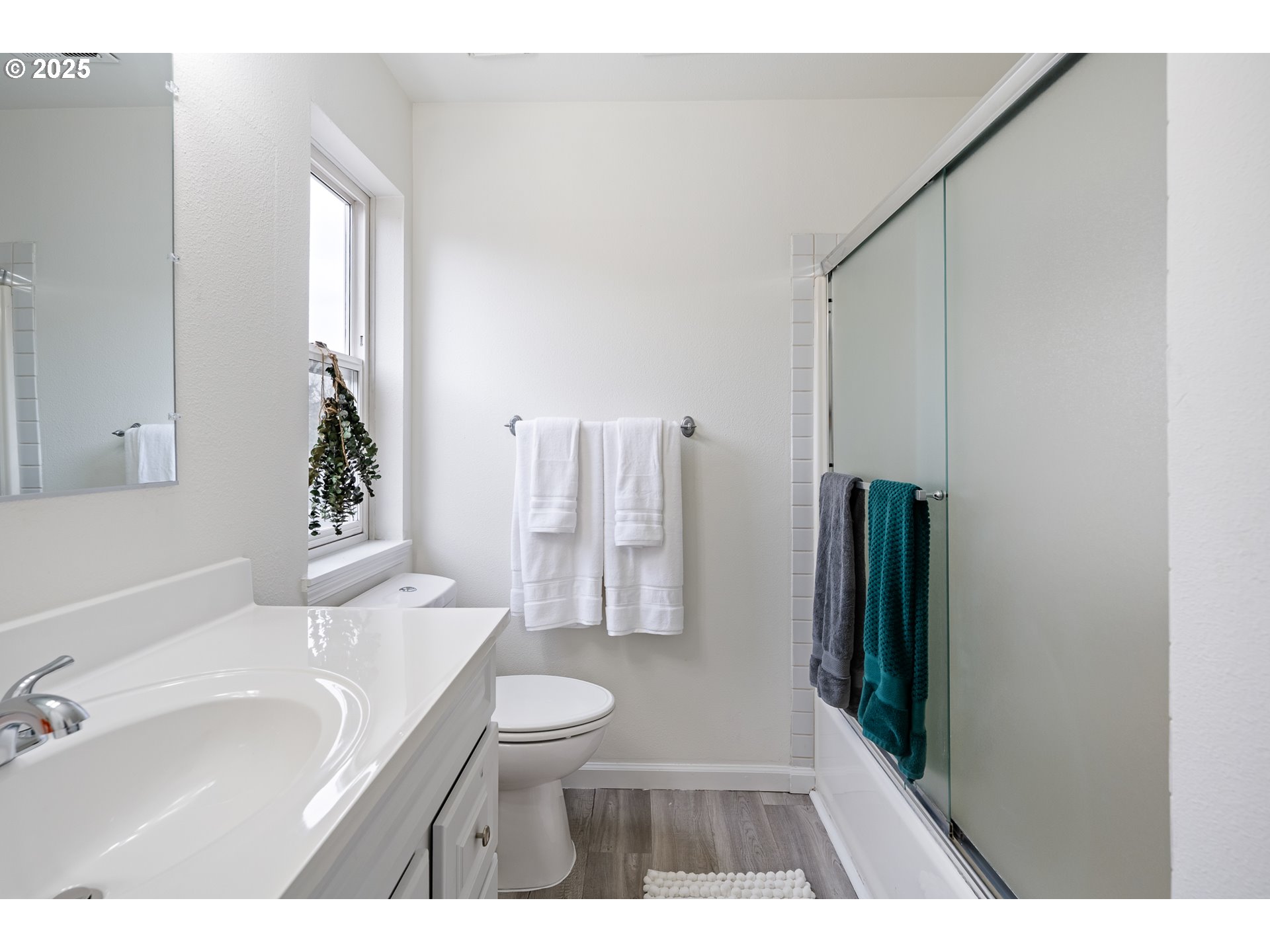 16033 Northwest Ridgetop Lane Beaverton, OR 97006 - Photo 16 of 42 a bathroom with a sink toilet and shower
